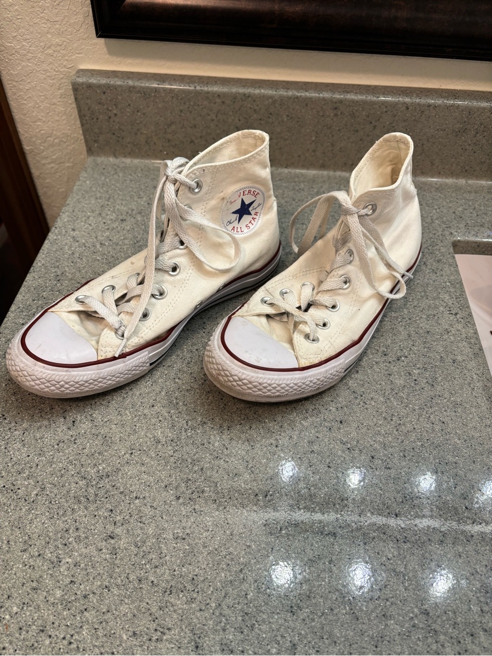 Converse White High Top Chuck Taylor Sneakers with Red Accent